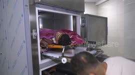 Relatives and friends of Two Palestinians, mourn over their body at the morgue of Jenin Hospital in the West Bank city of Jenin.
