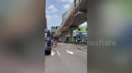 Crane collapses onto train carriage killing one and injuring nine others in Taiwan