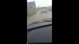 'The water was flowing at full force!' Torrential rain floods roads in Somerset, causing misery for drivers