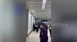 Ex-NBA superstar Yao Ming towers over security as he arrives in Philippines airport