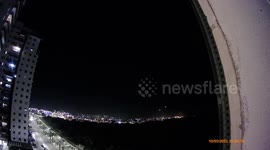 Security camera captures moment rockets launched from Gaza land in Israeli city