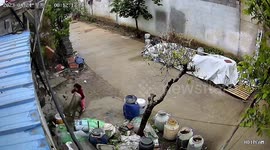 Chinese girl narrowly escapes injury as roof collapses due to heavy rainfall