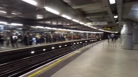 TFL celebrates coronation:  crowndel poster at Westminster station in central London