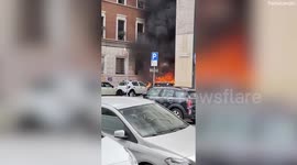 Video shows vehicles in flames after explosion in central Milan