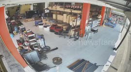 Stray wheel bounces into shop and smashes cabinets