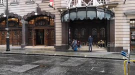 Heavy rain pours down on the West End of London after Thunder and lightning
