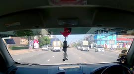 Skillful driver regains control of his car after hitting sedan that suddenly switched lanes