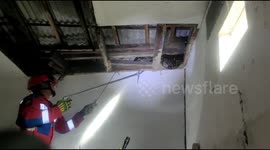 Firefighters remove HUGE python lurking in resident's attic
