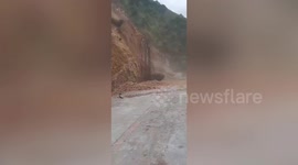 Landslide blocks mountain road when slope protection project collapses