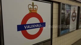 Coronation crowndel at Vauxhall tube station with Not My King protest message from anti-monarchists