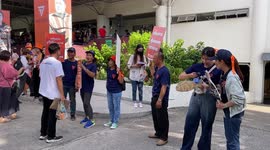 Progressive party supporters cheer on final day of election campaigning in Thailand