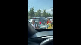 Excited kids want to fly out of their car seats after big sister surprises them