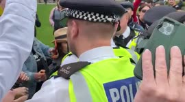 Protesters and police scuffle outside UK Parliament during anti-vaccination rally