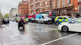 A Diplomats Convoy Followed By The Met Police Specialist Escort Group Seen Returning To Kensington Palace Gardens After The Coronation Of King Charles III