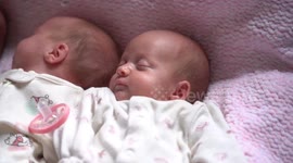 Married couple who beat one in 200 million odds by welcoming identical triplets have brought daughters home