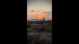 Puppy Photobombs Setting Sun Timelapse