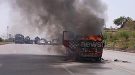 Bus engulfed in flames during Imran Khan bail protest in Islamabad, Pakistan