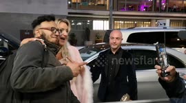 Daisy May Cooper poses for pictures with fans after leaving the BAFTAs