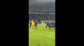 Barcelona players and coaches forced to flee pitch as violent Espanyol fans attack after La Liga title win