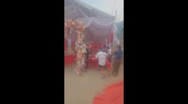 Dozens of people keep the pillars of the wedding theater