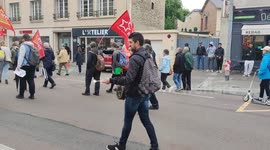 Mass protest in Paris against pension reform plans with firecrackers