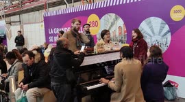 Parisian commuters enjoy a public piano in train station of Gare d'Austerlitz, Paris, France. 15 may 2023. (Song: Counting Stars - OneRepublic)