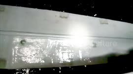 Drug smugglers rescued from sinking narco-submarine carrying more than three tonnes of cocaine in Colombia