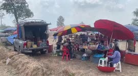 Dust devil tears through stalls injuring one at Rocket Festival in Thailand