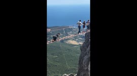 Man Screams As He Crawls Across Suspension Bridge