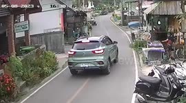 Strong winds tear off metal roof sheet and hit passing man