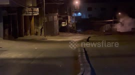 Palestinian demonstrators clash with Israeli forces during an Israeli forces and settlers raid to the site of Joseph’s Tomb, east of the West Bank city of Nablus