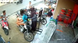 Chaos as motorcyclist unable to control vehicle drives through store in Indonesia