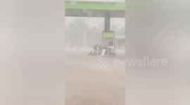 Heavy rainstorm pummels fuel station in central Thailand