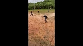 Brave amateur football team defies ADVERSE pitch conditions and plays on extremely muddy field