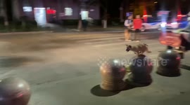 Xiaohuang's joyful night: a playful leap among marble blocks