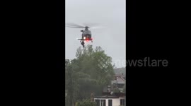 Helicopter airlifts residents trapped in floods in Cesena, Italy