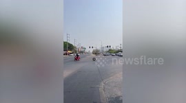 Stray wheel bounces along road amusing drivers