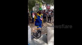 US: American Rapper Flava Flav Supports WGA Demonstrators With Pizza And Music In Los Angeles