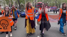 Ruth Lanser from Just Stop Oil speaks about why she is blocking the roads around Parliament Square London UK