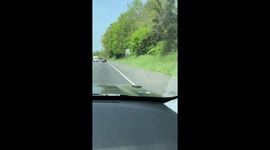 Phone Left On Car Hood at Highway Speeds
