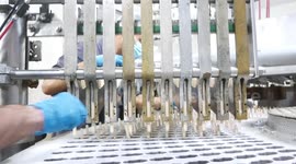 Palestinian employees produce the ice cream during summer season at an ice cream factory, in Gaza city