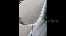 Volcanic ash covers car in Puebla, Mexico, as Popocatepetl increases activity