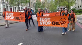 Just Stop Oil protesters slow walk along Cromwell Road, Earls Court causing traffic chaos, London, England, UK