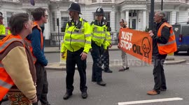 Police issue a Section 12 order to Just Stop Oil protesters slow walking along Cromwell Road, Earls Court, London, England, UK