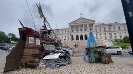 Angry local lives in homemade pirate ship outside Portuguese parliament building