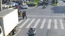 Electric tricycle drags woman on street when rope from vehicle tangles into her feet in China