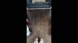 Woman annoyed as her $4000 TV screen is blessed with an 'Eternal Flame'