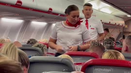 Belligerent Man Argues With Wife and Staff on Flight