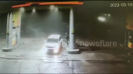 Motorist flees gas station despite flames erupting from their vehicle