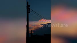Spectacular cloud iridescence illuminates sky in the Philippines